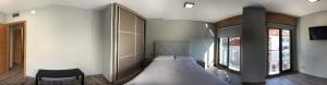 Postel nebo postele na pokoji v ubytování Apartamentos Augusto
