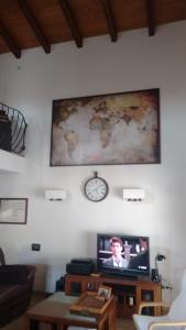 TV a/nebo společenská místnost v ubytování Casa Paca