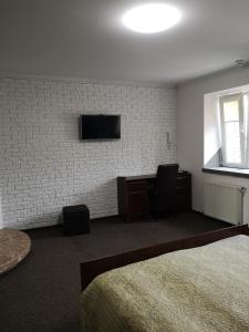 TV a/nebo společenská místnost v ubytování Apartments like hotel