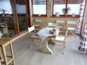 Restoran või mõni muu söögikoht majutusasutuses Affittacamere Krajnc