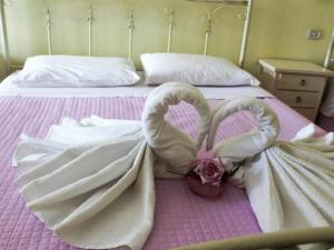 Postel nebo postele na pokoji v ubytování Masseria Lama D'impisa