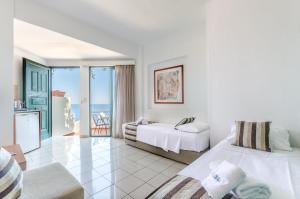 Postel nebo postele na pokoji v ubytování Pela Mare Hotel
