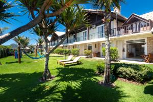 Κήπος έξω από το Pousada Morada do Guaruça