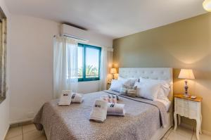 Postel nebo postele na pokoji v ubytování Pela Mare Hotel