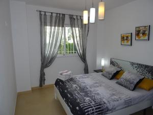Postel nebo postele na pokoji v ubytování Apartamento Azul Beach La Mata Playa