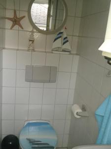 Ένα μπάνιο στο Ferienwohnung Rucksack-Bimbes