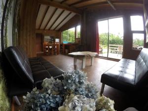 Posezení v ubytování Ecoreserva Quelhue Lodge y Cabañas