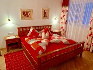 Rúm í herbergi á Appartements Zillertal Noten