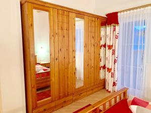 Rúm í herbergi á Appartements Zillertal Noten