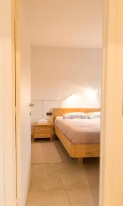 Postel nebo postele na pokoji v ubytování Guesthouse De Vliere
