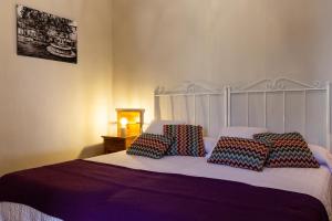 Postel nebo postele na pokoji v ubytování Casa Rosalía