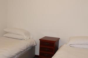 Кровать или кровати в номере Welltrees Apartments 8 Dailly Road