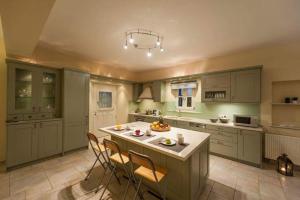 Kuchyň nebo kuchyňský kout v ubytování Ninemia mjf