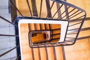 a stairwell with a window in a room at Casa Rosalía in Ibi