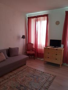 TV a/nebo společenská místnost v ubytování Casa Rafut