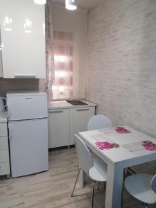 A kitchen or kitchenette at Apartment "GARDEN" on Gundulićeva 8