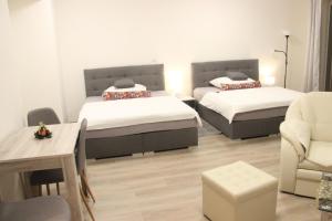 Un pat sau paturi într-o cameră la Apartman Praha