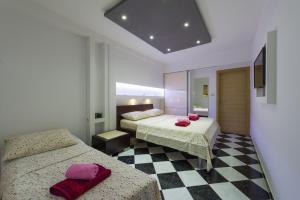Posteľ alebo postele v izbe v ubytovaní Superb Beachfront Luxury Seaview with Private Beach