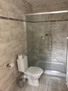 Koupelna v ubytování Apartment Šarka
