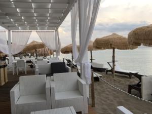 A restaurant or other place to eat at Punta Prosciutto apartments to rent