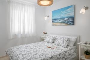 Postel nebo postele na pokoji v ubytování Villa Meadow + 28 fotografií
