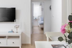 TV a/nebo společenská místnost v ubytování Villa Meadow
