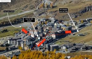 an aerial view of a city with buildings at Golf & SKI studio in Breuil-Cervinia