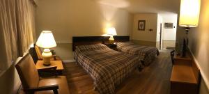 Cama o camas de una habitación en Tumbleweed Motel