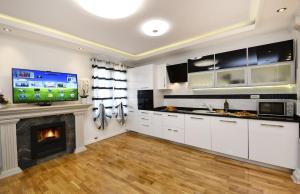 Kuchyň nebo kuchyňský kout v ubytování Apartment Markovski