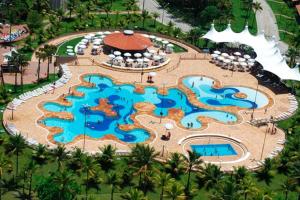 Πισίνα στο ή κοντά στο Villagio com Piscina e Wi-Fi - Disponível Natal e Reveillon