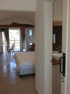 Ένα ή περισσότερα κρεβάτια σε δωμάτιο στο Kenzho Apart. del Diablo