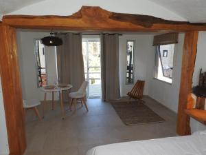 Ένα ή περισσότερα κρεβάτια σε δωμάτιο στο Kenzho Apart. del Diablo