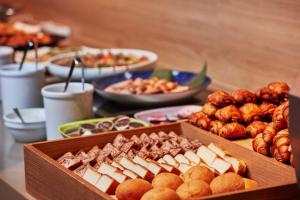 a table topped with different types of food at Allamanda Imgya Coral Village in Miyako Island +58 photos