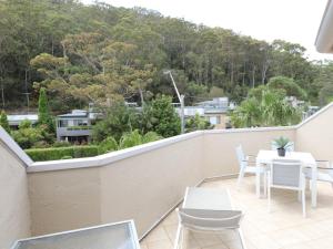 Un balcón o terraza en Tree Tops at Iluka Resort Apartments
