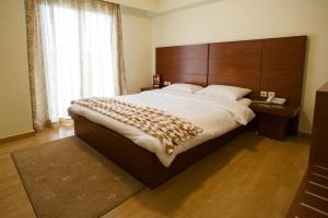 Cama o camas de una habitación en Olympion