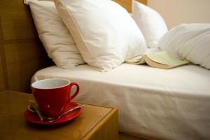 Cama o camas de una habitación en Olympion