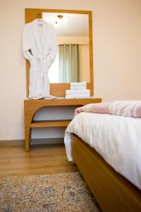 Cama o camas de una habitación en Olympion