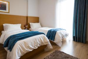 Cama o camas de una habitación en Olympion