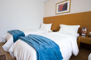 Cama o camas de una habitación en Olympion