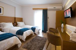 Cama o camas de una habitación en Olympion