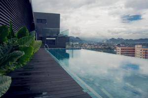 a swimming pool on top of a building at M Roof Hotel & Residences in Ipoh