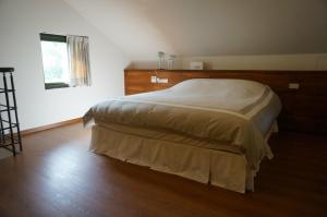 Postel nebo postele na pokoji v ubytování Coconut Beach Homestay