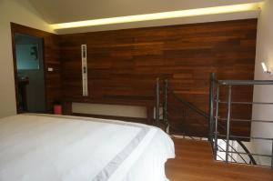 Postel nebo postele na pokoji v ubytování Coconut Beach Homestay