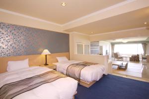 Cama ou camas em um quarto em Shiretoko Daiichi Hotel
