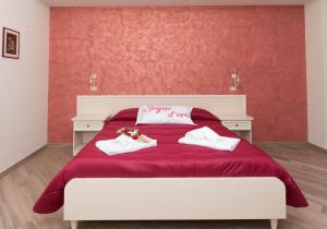A bed or beds in a room at B&B Vista Santuario