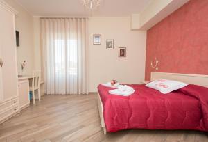A bed or beds in a room at B&B Vista Santuario
