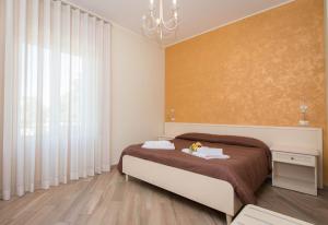 A bed or beds in a room at B&B Vista Santuario