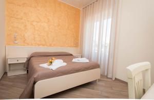 A bed or beds in a room at B&B Vista Santuario