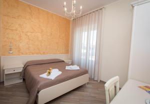 A bed or beds in a room at B&B Vista Santuario