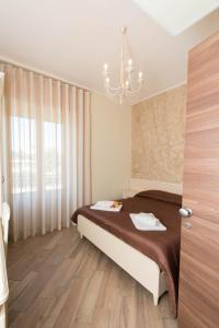 A bed or beds in a room at B&B Vista Santuario